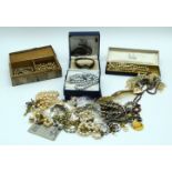A quantity of broaches, watches and other costume jewellery . (Qty).