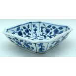 A Chinese porcelain blue and white square shaped bowl decorated with lotus plants. 6 x 19.5cm