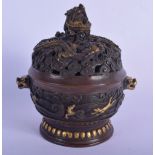 A CHINESE TWIN HANDLED BRONZE CENSER AND COVER 20th Century, overlaid with dragons and clouds. 18 cm