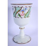 A VINTAGE BOHEMIAN GLASS GOBLET painted with flowers. 18 cm high.