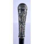 AN ANTIQUE INDIAN EASTERN SILVER MOUNTED EBONY WALKING CANE decorated with figures. 86 cm long.