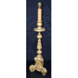 An antique large gilded plaster and wood candlestick converted to a lamp 81 x 22 cm.