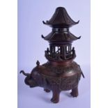 A 19TH CENTURY CHINESE BRONZE ELEPHANT CENSER AND COVER bearing Xuande marks to base. 25 cm x 14 cm.