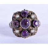 AN ANTIQUE SILVER, AMETHYST AND SEED PEARL RING. Size L, weight 5g