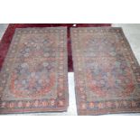 A pair of large Persian rugs 218 x 135 cm