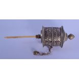 AN EARLY 20TH CENTURY TIBETAN BONE AND WHITE METAL PRAYER WHEEL. 18 cm long.