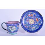 A RARE 19TH CENTURY CHINESE CANTON ENAMEL CUP AND SAUCER Qing, of almost European form, painted with