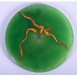 AN APPLE GREEN JADE BI DISC. 7.5cm diameter