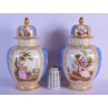 A LARGE PAIR OF 19TH CENTURY GERMAN AUGUSTUS REX VASES AND COVERS painted with lovers. 37 cm x 18 cm