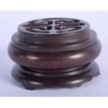 A CHINESE BRONZE CENSER ON STAND. 7cm diameter, 4cm high (3)