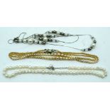 A pearl necklace together with two other sets of paste pearls 44cm (3).