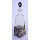 AN ANTIQUE CONTINENTAL SILVER MOUNTED GLASS DECANTER AND STOPPER decorated with figures. 29 cm high.