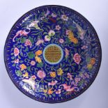 AN 18TH/19TH CENTURY CHINESE CANTON ENAMEL CIRCULAR DISH Qianlong/Jiaqing, painted with flowers and