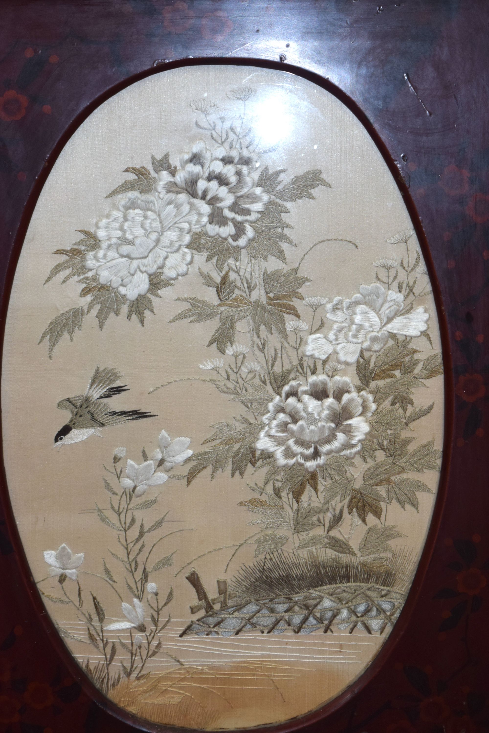 A framed Chinese silk depicting birds in foliage.54 x 36 cm. - Image 2 of 3
