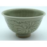 A small Chinese porcelain Yaozhou celadon bowl 7 x 11.5cm.