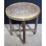 A small Islamic brass top table 59 x 60 cm (2)