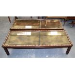 A PAIR OF 19TH CENTURY CHINESE MOTHER OF PEARL INLAID GLAS COFFEE TABLES decorated with foliage. 145