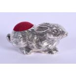 A SILVER RABBIT PIN CUSHION. 5cm x 2.5cm, weight 31g