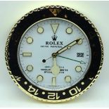 A contemporary Rolex dealership clock 34cm