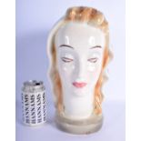 AN ART DECO AUSTRIAN GOLDSCHEIDER POTTERY BUST OF A FEMALE. 30 cm x 14 cm.