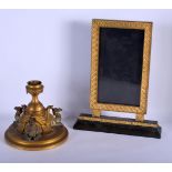 A 19TH CENTURY EGYPTIAN REVIVAL BRASS CAMEL CENTREPIECE together with a bronze mirror. Largest 35 cm