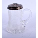 A SILVER AND GLASS SUGAR SIFTER. 10 cm x 7 cm.