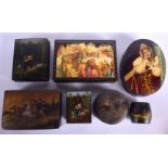 FIVE 19TH CENTURY RUSSIAN BLACK LACQUER PAPER MACHE BOXES decorated with various scenes, together wi