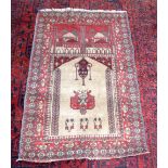 An Islamic Prayer rug 113 x 76 cm