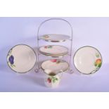 A SET OF VINTAGE CONTINENTAL PORCELAIN PLATES with matching jug and stand, Stand 38 cm high. (qty)
