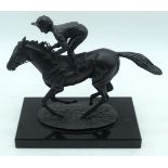 By David Cornell a bronze of Lester Piggott entitled Champion finish on a polished marble plinth 19