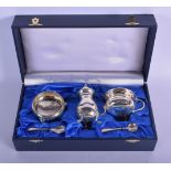 A MODERN SILVER CRUET SET. Birmingham 1994. Silver 194 grams. Largest 9 cm x 4 cm.