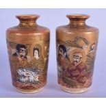 A PAIR OF EARLY 20TH CENTURY JAPANESE TAISHO PERIOD SATSUMA VASES painted with immortals. 9.5 cm hig
