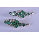 A PAIR OF WHITE GOLD AND EMERALD EARRINGS. 5 grams. 3 cm x 1 cm.