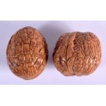 TWO EARLY 20TH CENTURY CHINESE CARVED WALNUTS Late Qing/Republic. 4.5 cm x 3.5 cm.