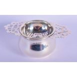 A STERLING SILVER TEA STRAINER AND DRIP TRAY. Hallmarked Birmingham 1956, 11cm x 4.5cm, weight 68g