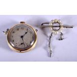 AN EDWARDIAN GOLD ENAMEL AND SEED PEARL BROOCH WATCH. 20 grams. 3 cm diameter.