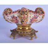 AN ANTIQUE HUNGARIAN J FISCHER BUDAPEST FAIENCE BOWL painted with flowers. 22 cm x 14 cm.