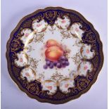 Royal Worcester plate, the centre painted with fruit, signed: 'H. Ricketts', the border with rose sp