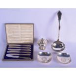 A SET OF SILVER HANDLED KNIVES together with a pair of silver dishes, a mustard pot and a ladle. Wei