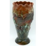 A Torquay ware pottery vase decorated with a dragon 29cm.