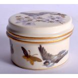 AN ANTIQUE EUROPEAN AESTHETIC MOVEMENT PORCELAIN BOX AND COVER painted with birds. 8 cm diamter.