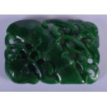 A CHINESE CARVED JADE PENDANT. 7.5cm x 5cm, weight 57g