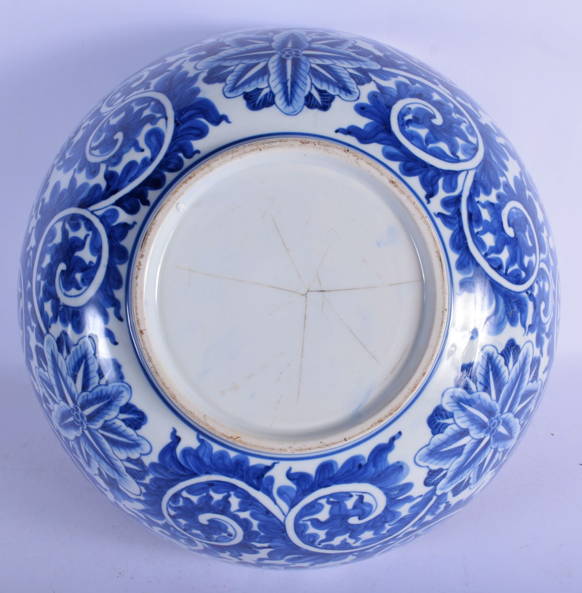 A LARGE 19TH CENTURY CONTINENTAL BLUE AND WHITE PORCELAIN BOWL well painted with bold floral sprays. - Image 5 of 5