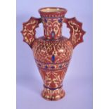 AN ANTIQUE SPANISH HISPANO MORESQUE TIN GLAZED ALHAMBRA VASE painted with motifs. 23 cm high.