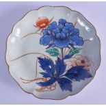 AN 18TH/19TH CENTURY JAPANESE EDO PERIOD PORCELAIN DISH painted with floral sprays. 19 cm wide.