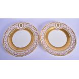 Minton fine pair of plates with pierced borders painted with rose chains and gilded with three acid