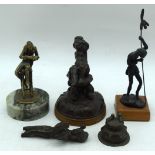A small bronze of Uriah Heap together with a bronze of a native by Curtis and two other bronzes. 19c
