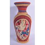 AN EARLY 20TH CENTURY SOUTH AMERICAN OVERLAID POTTERY VASE decorated with motifs. 29 cm high.