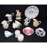 A collection of mostly 18th Century ceramics including cups, jugs & a figurine together with some Co