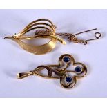 A 9CT GOLD BROOCH and a gold pendant. 4 grams. Largest 3 cm x 1.75 cm. (2)